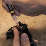 4UANTUM High SPEED Axle and Trigger Oil - Orange - obrazek 4